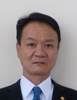 新垣利治村長写真